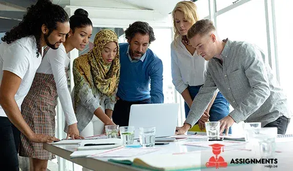 Qualified academic writers working together on assignments for UAE students